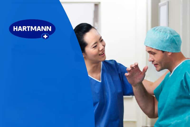 Harmann advertising preview showing a woman nurse and a man nurse talking and smiling