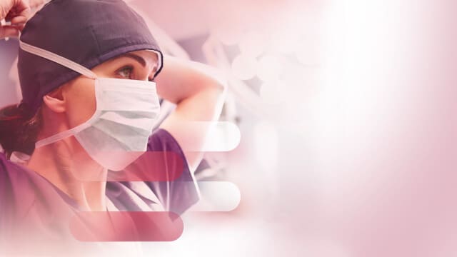 presentation MAHA Belfius 2021 photo of a woman nurse putting her medical face mask before work, in a gradient of reds background